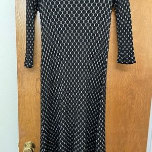 Black and camel color dress. Long sleeves very comfortable. Size small.